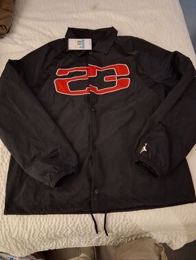 Jordan Men’s Black Windbreaker with Red 23 Patch